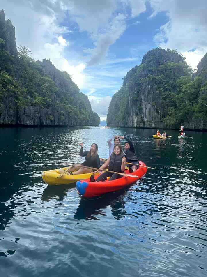 Kayaks in a limestone lagoon on El Nido Tour A