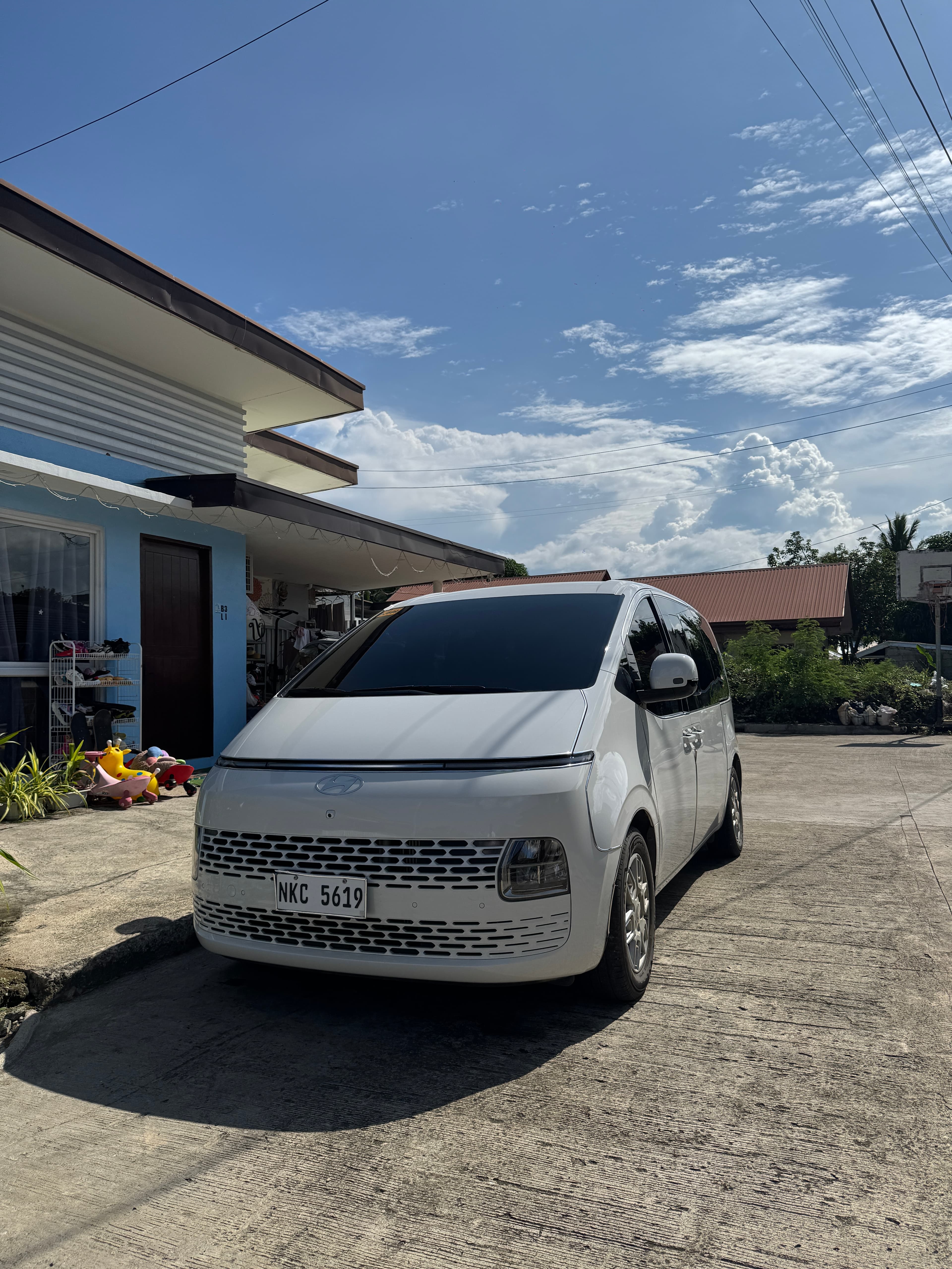 Premium luxury van hire Puerto Princesa - premium exterior Honda Bay Underground River tours