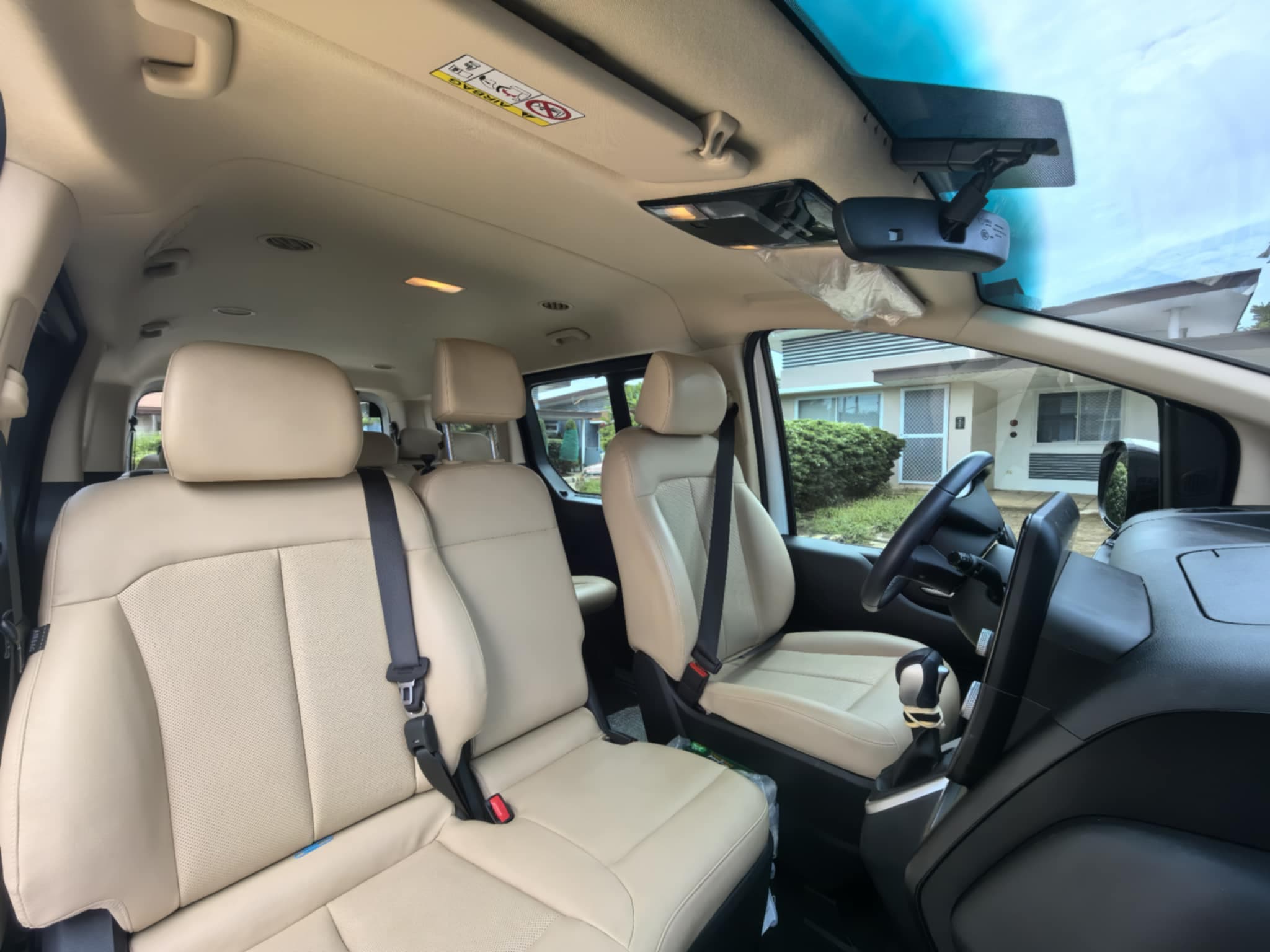 Professional driver van hire Puerto Princesa - modern cockpit controls airport transfer service